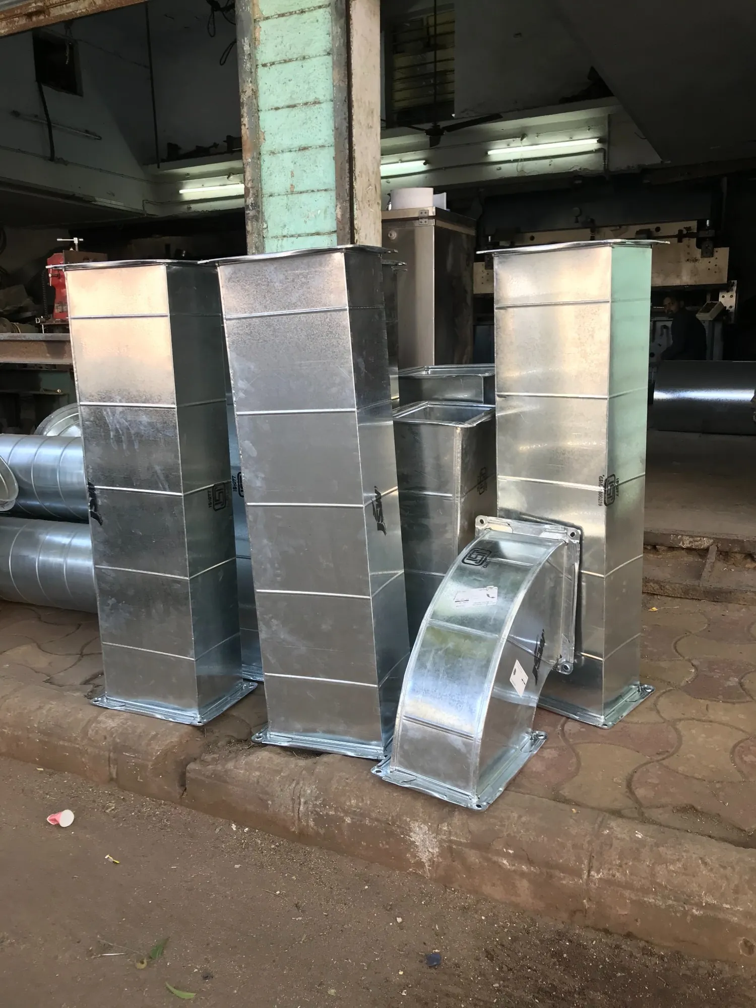 Fabricated GI duct sections, bends and transitions ready for site